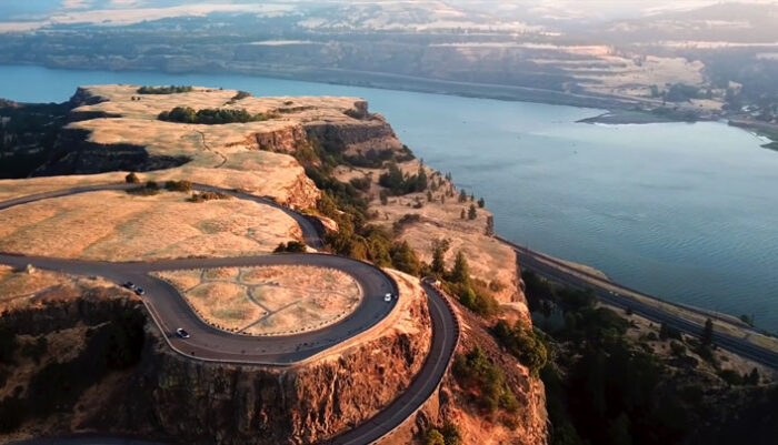 A Long And Winding Road Going Up The Mountain Rock Plateau